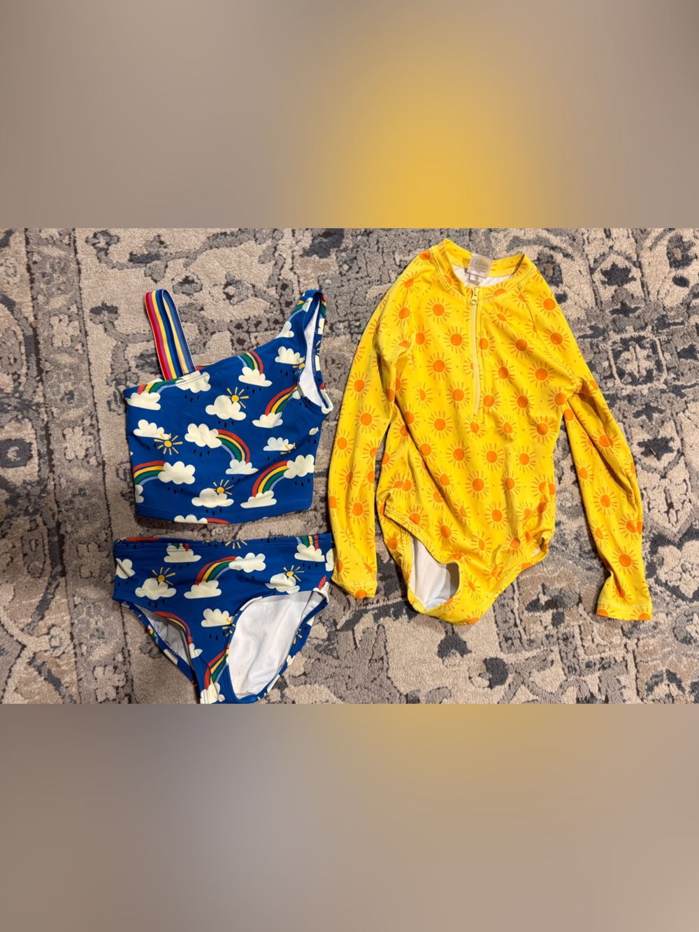 2 Hanna Andersson Swimsuits, blue is size 130 UK (8 US) and yellow is 120 UK (6)